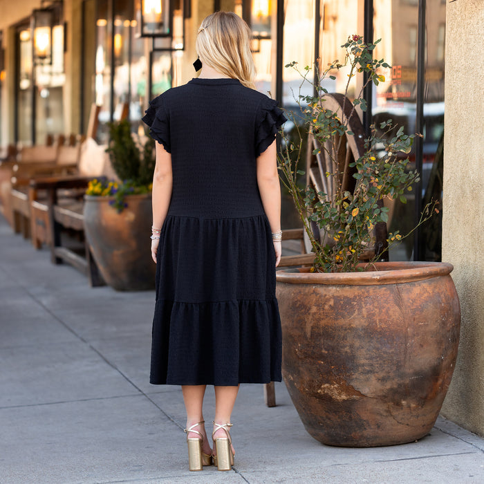 50020 - Solid Color Textured Dress with Ruffled Sleeves and Pockets - Black
