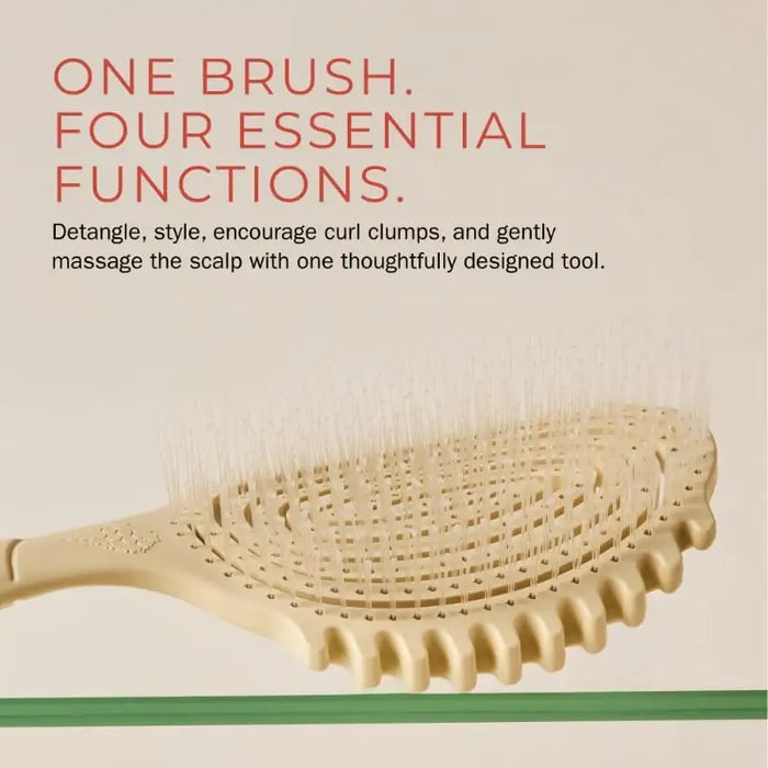 Curly hair brush for detangling, styling, and scalp massage – one tool, four essential functions