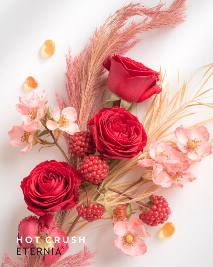 Hot Crush perfume mist scent set with red roses and pink petals, Eternia label