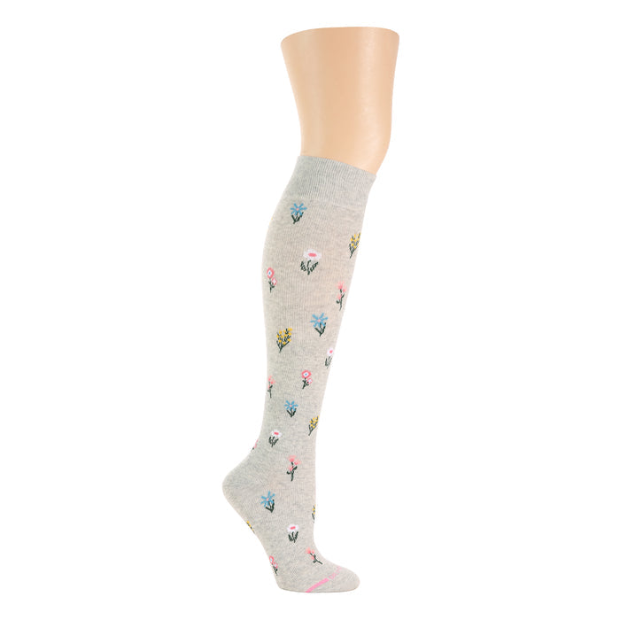 Knee-high compression socks in gray with a floral pattern in various colors.