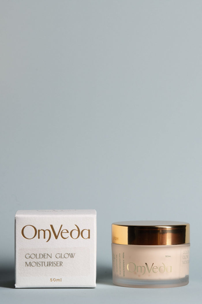 OmVeda Golden Glow moisturiser jar with gold lid and 50 ml box