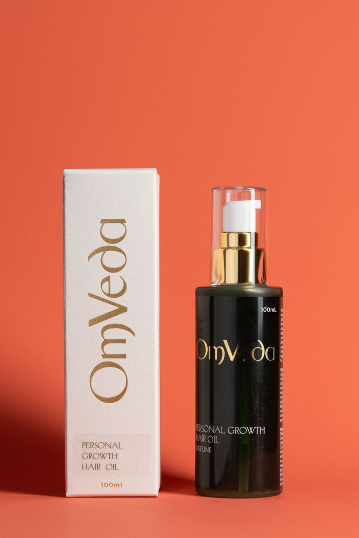 Personal growth hair oil bottle with pump and 100 ml carton