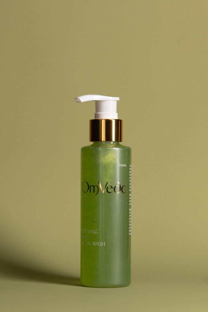 OmVeda purifying neem facial wash, 150 ml, green bottle with gold pump