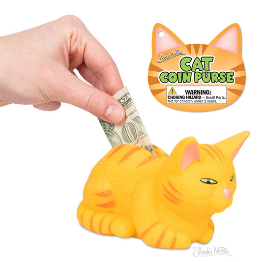 A hand inserts a dollar into the Orange Tabby Cat Coin Purse, ideal for cat lovers. The label, Orange Tabby Cat Coin Purse, perfectly captures feline enthusiasts charm.