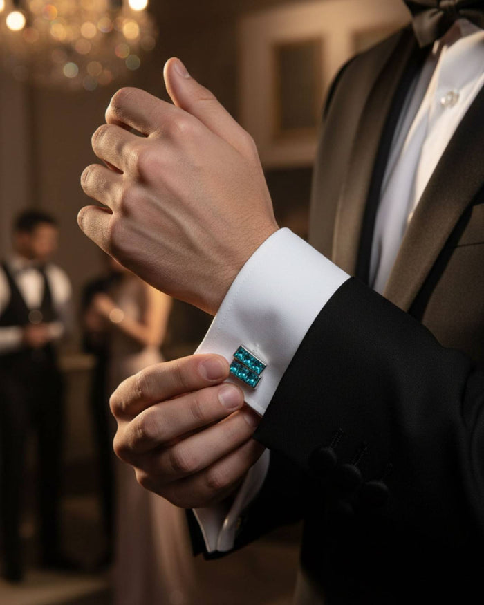 Men's aqua blue faceted crystal square cufflinks on a white shirt cuff