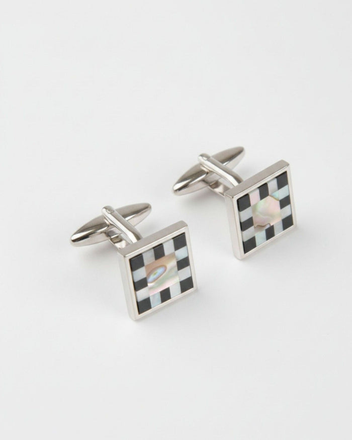 Square cufflinks with black checkerboard mother-of-pearl inlay and silver frames