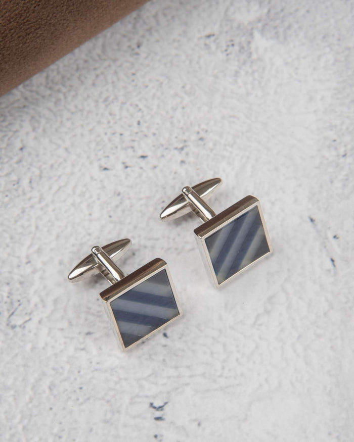 Square silver cufflinks with dark blue striped panels and bar backs