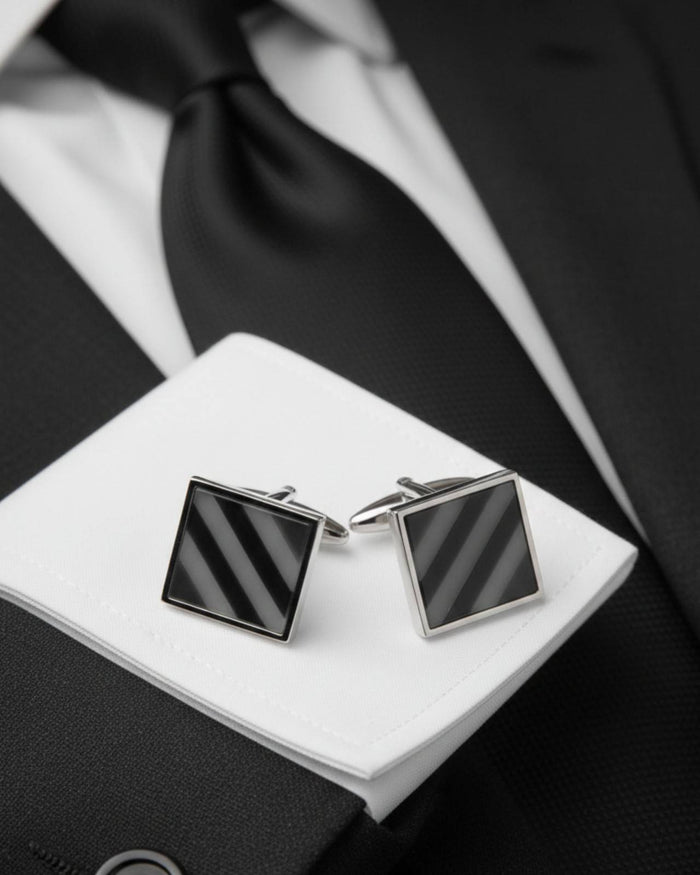 Square silver cufflinks with black-and-blue diagonal stripe inlay