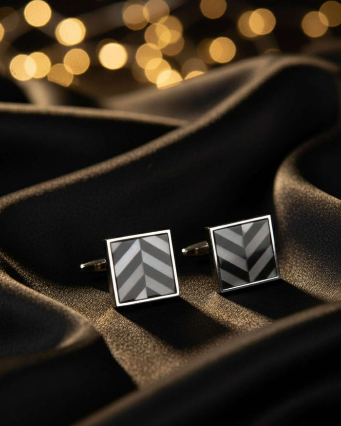 Square silver cufflinks with grey diagonal striped stone and polished square frames