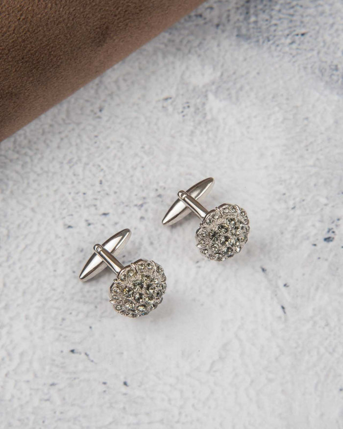 Round silver crystal cufflinks with clustered stones and pin-through posts