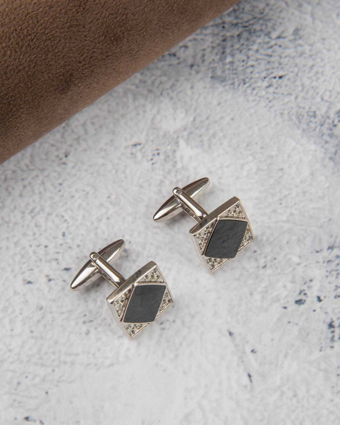Silver square cufflinks with dark center stones and crystal edging