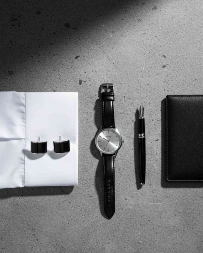 Pair of black enamel rectangular cufflinks with silver-tone bars