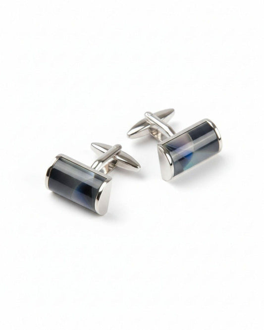 Cylindrical silver-tone cufflinks with glossy dark resin barrels and hinged bars