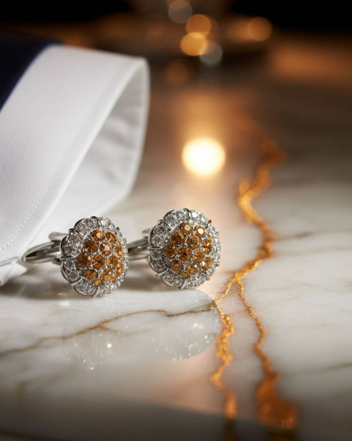 Round crystal cluster cufflinks with silver-toned border and amber center