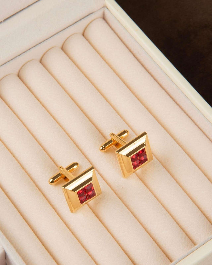 Gold tone square cufflinks with red crystal mosaic inset
