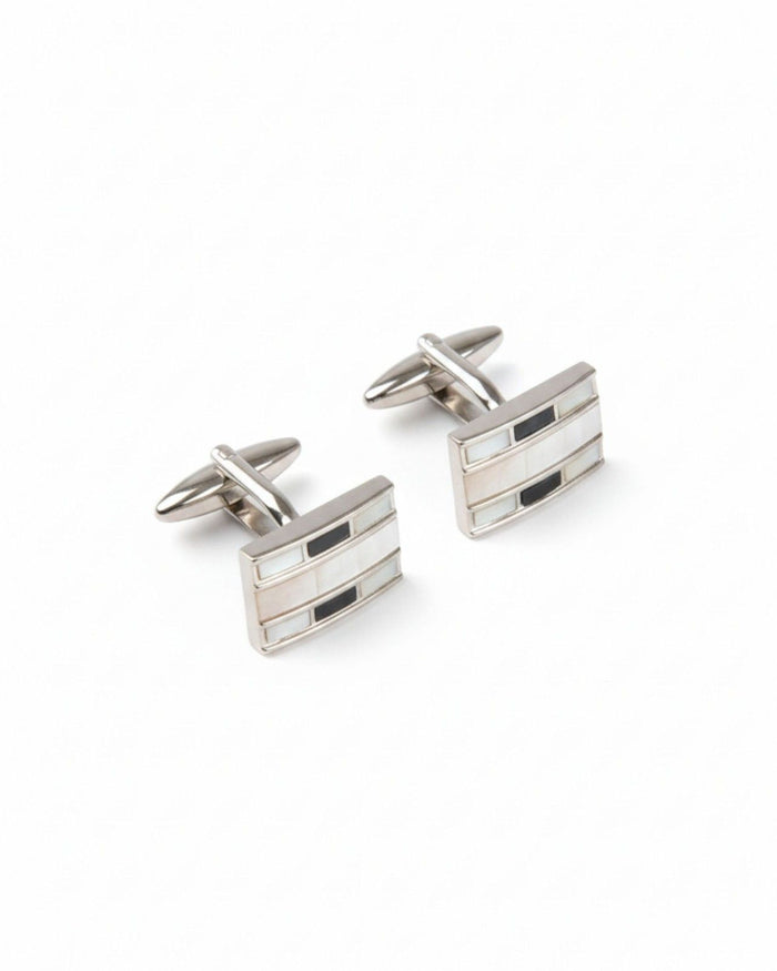 Rectangular silver tone cufflinks with black and white striped inlay