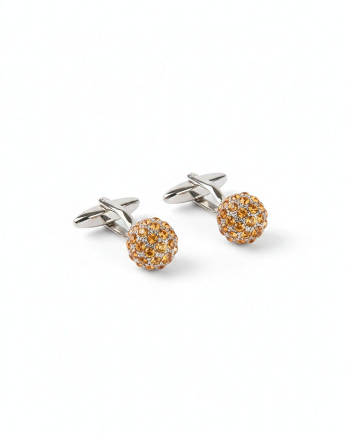 Gold-tone round pavé crystal cufflinks with dome design and hinged backs
