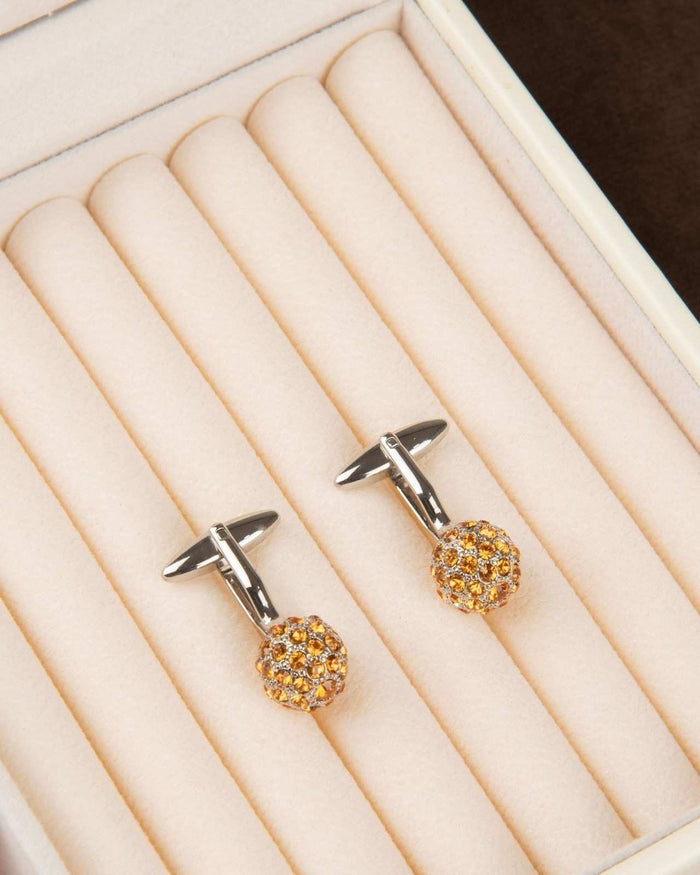 Pair of round pavé crystal dome cufflinks in a cream display box
