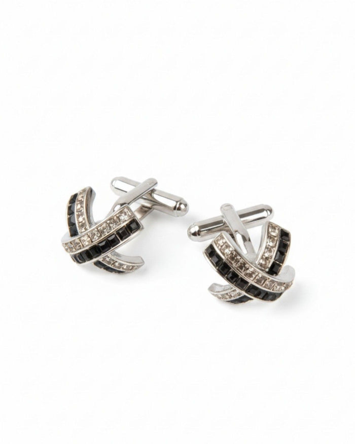 Silver cufflinks with black crystal curve pattern, arched segmented design
