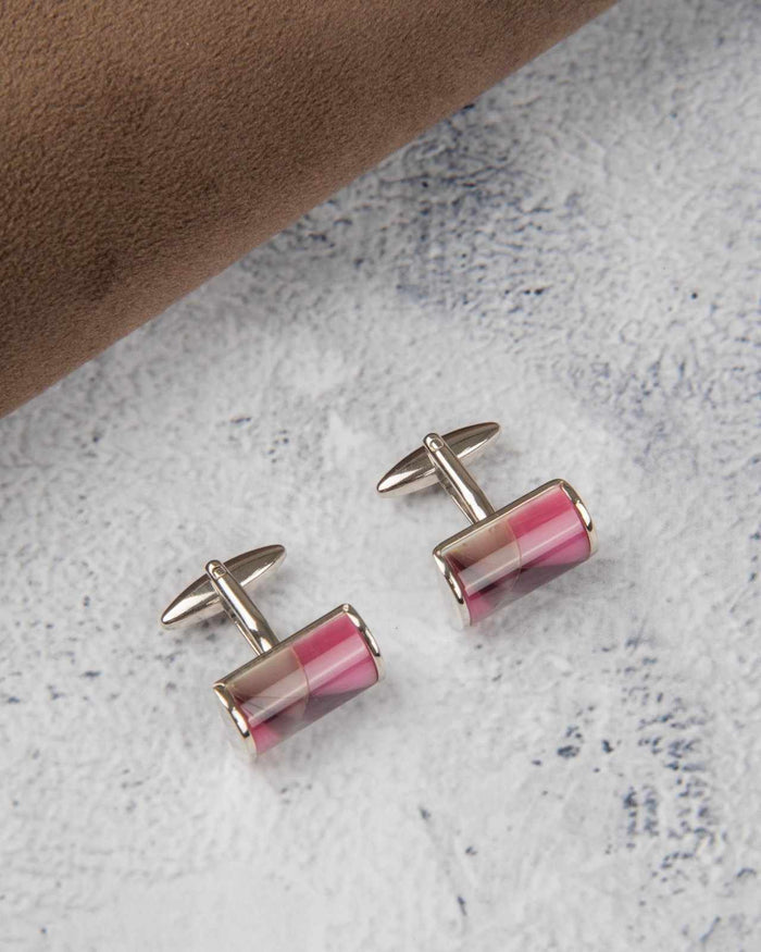 Silver-tone cufflinks with pink cylinder stripes and crossbar design