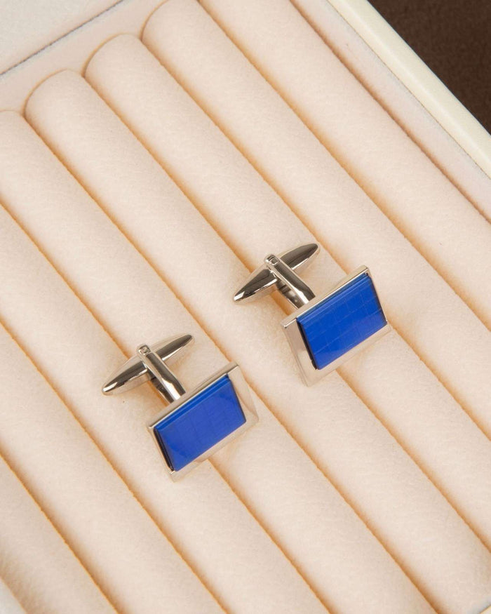 Pair of silver square enamel cufflinks with blue rectangles and cross posts