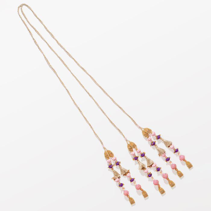 Traditional parandi with crystal embellishments, pearl strands and vibrant tassel details