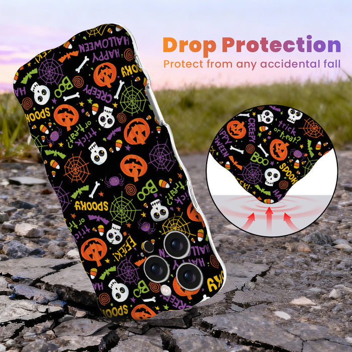 Drop protection diagram for the Spooky Wavy Luxe MagSafe iPhone case, black with orange pumpkins and skulls, showing the cushioned corner on pavement.