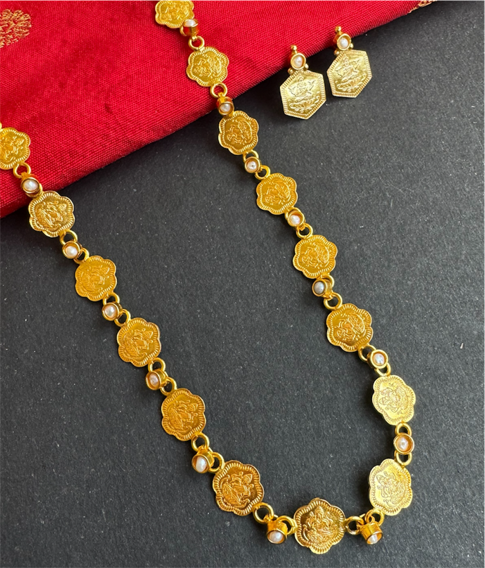 The Poornika Silver Lakshmi Pearl Kasumala Necklace & Earrings